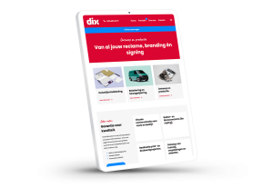 Laptop en telefoon met daarop de website van Dix Reclame