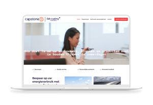 Laptop en telefoon met daarop de website van Dak-coating