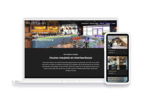 Laptop en telefoon met daarop de website van Van Ommen Creaties