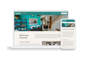 Laptop en telefoon met daarop de website van Blaricumse Haarzaak