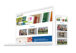 Laptop en telefoon met daarop de website van Klimop Stad