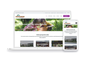 Laptop en telefoon met daarop de website van Kinderopvang Sterrenrijk