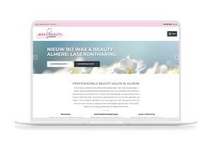 Laptop en telefoon met daarop de website van Wax en beauty Almere