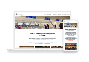 Laptop en telefoon met daarop de website van Bowlingvereniging Huizen
