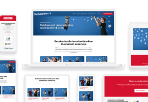 Laptop en telefoon met daarop de website van De Buitenburcht