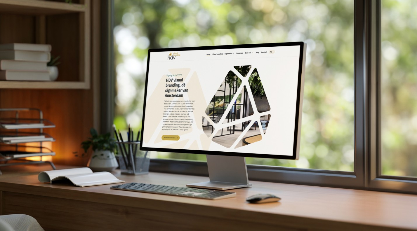 iMac met de website van HDV visual branding in beeld