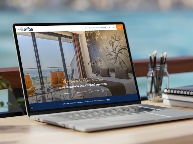 Een laptop met daarop de website van Hotel/Restaurant MIBA  afgebeeld