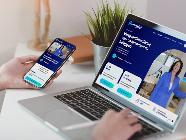 Macbook and iPhone with the website of Mogelijk Vastgoedfinanciering